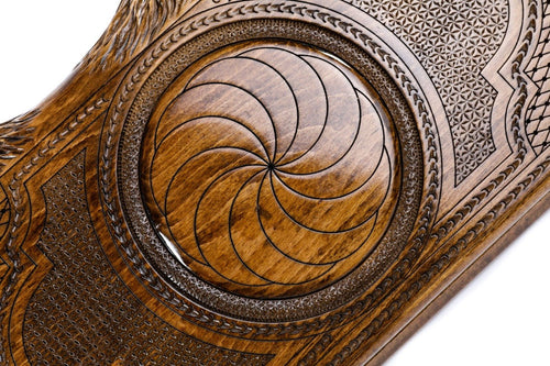 An angled view of the Hrachya Ohanyan board highlighting the deep wood grain and the custom-shaped mountain edges.