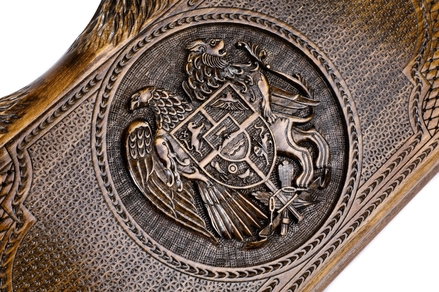 An angled view of the Hrachya Ohanyan Armenian emblem board highlighting the depth of the 3D wood carvings and mountain-shaped edges.
