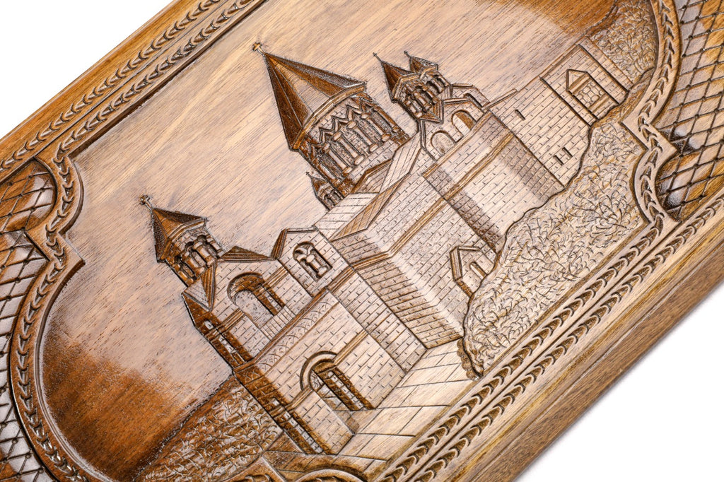 The interior of the open wooden backgammon board highlighting the smooth wood finish and professional playing pips.