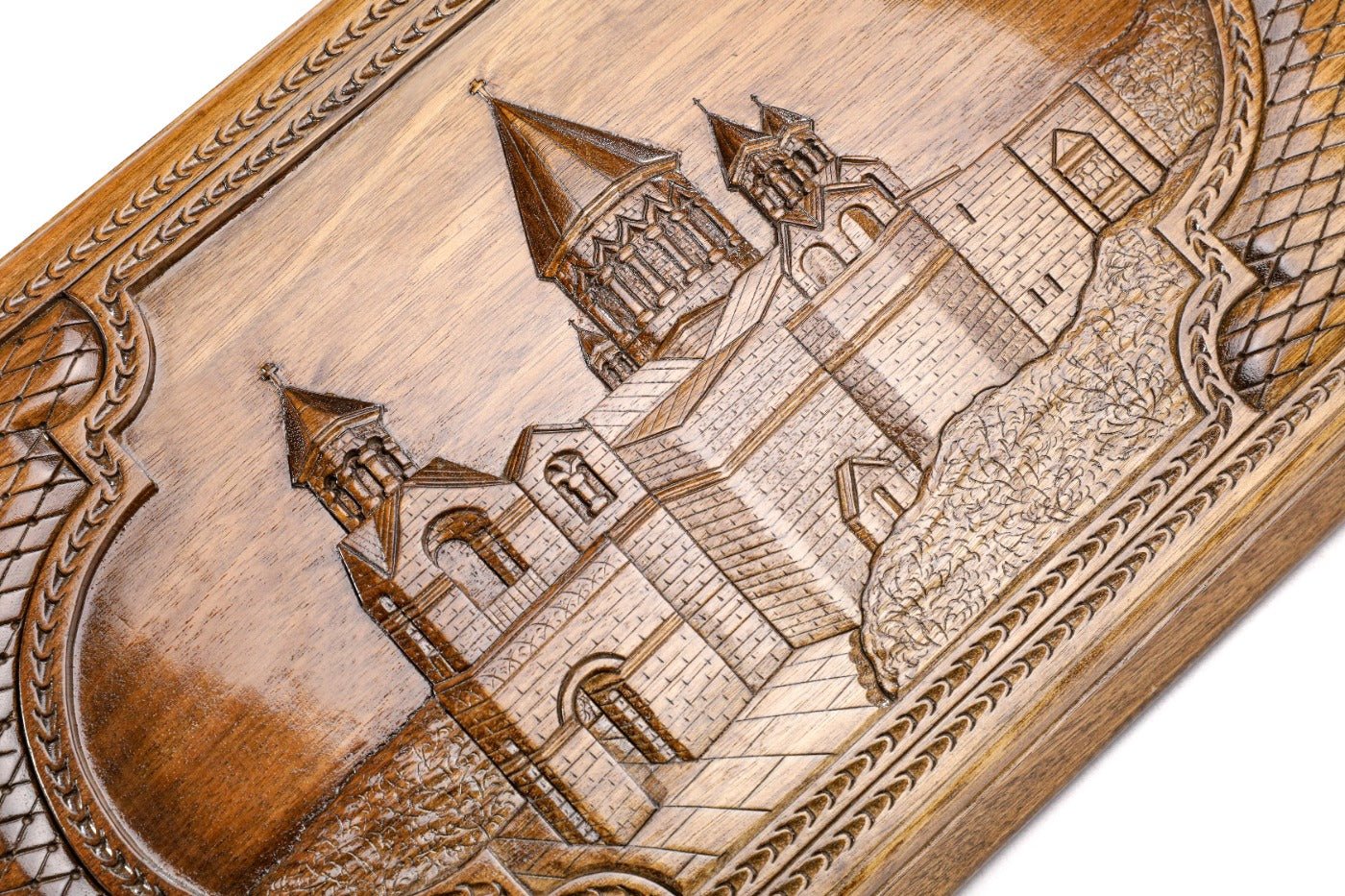 The interior of the open wooden backgammon board highlighting the smooth wood finish and professional playing pips.