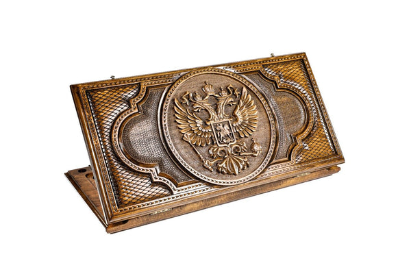 A frontal shot of the closed Russian Coat of Arms classic backgammon board showcasing the detailed double-headed eagle relief.