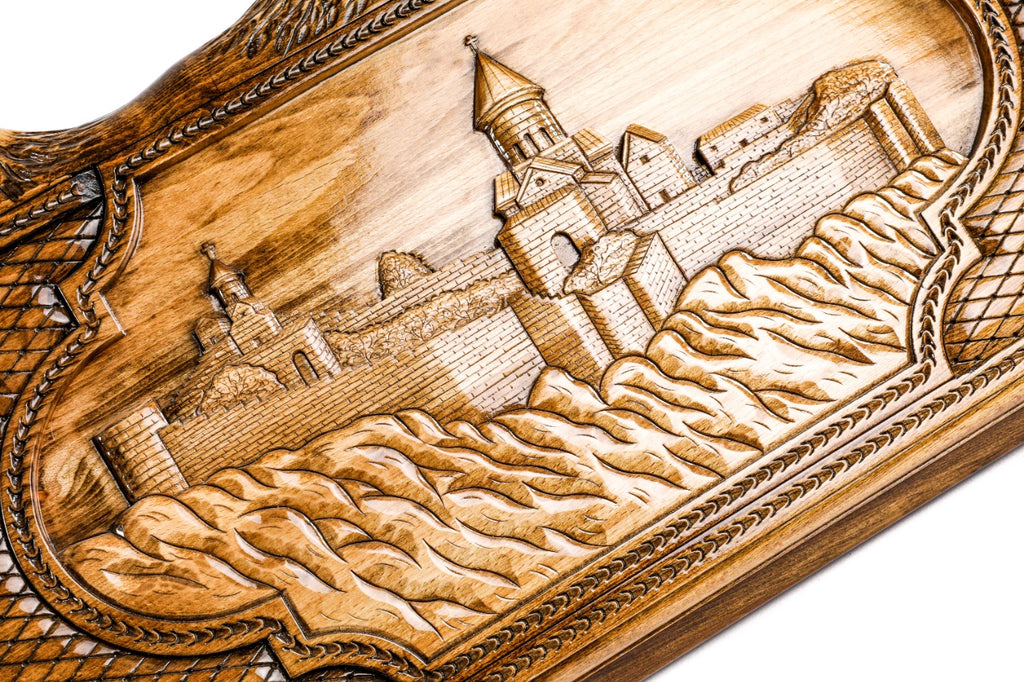 Frontal view of the detailed architectural wood carving on the Hrachya Ohanyan board.