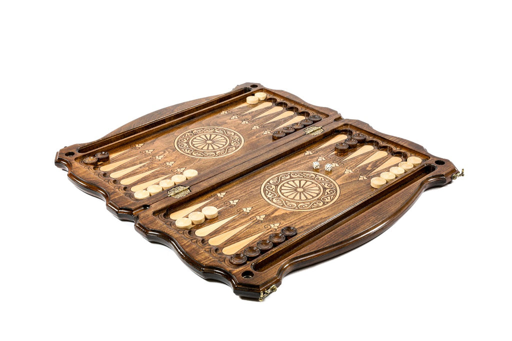 A close-up view focusing on the sharp, detailed heraldry of the eagle and lion on the textured solid wood surface.