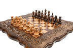 Wooden chess board featuring detailed handcrafted ornamental patterns