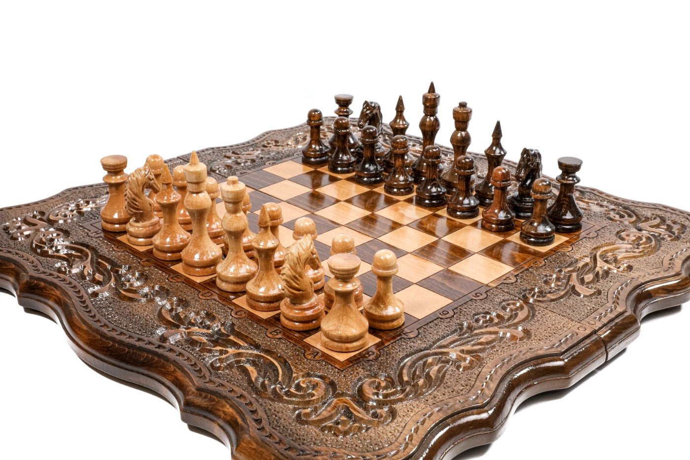 Wooden chess board featuring detailed handcrafted ornamental patterns