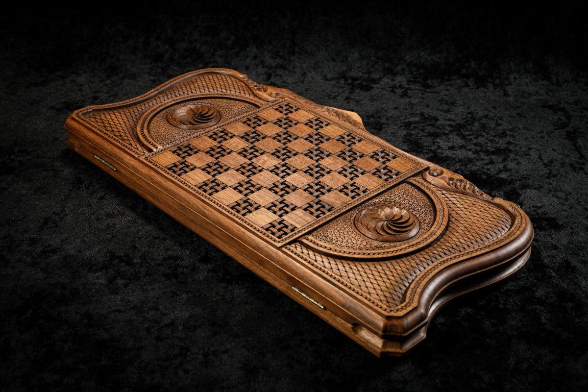Back cover from above: carved basket-weave chequerboard and eternity whirl cartouches, contour edge