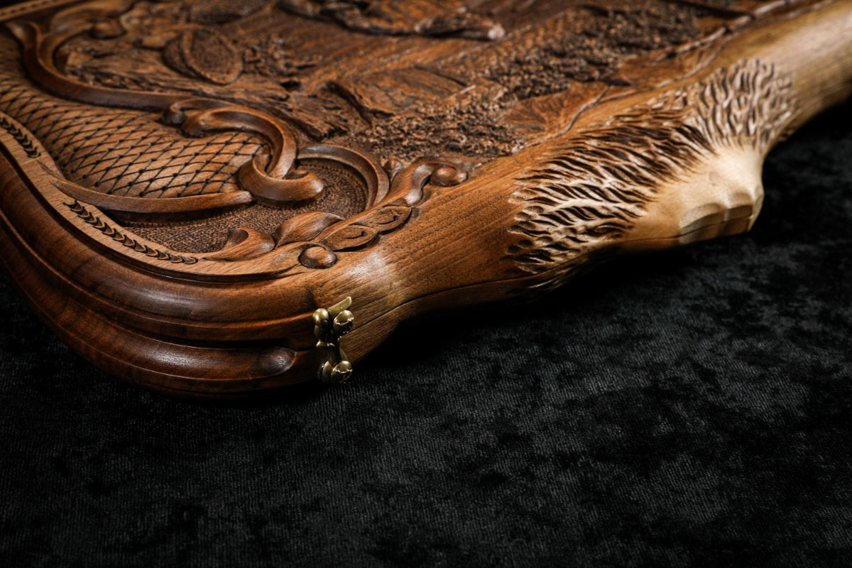 Carved Ararat peak at the corner of the lid with the scroll frame and cast-bronze clasp