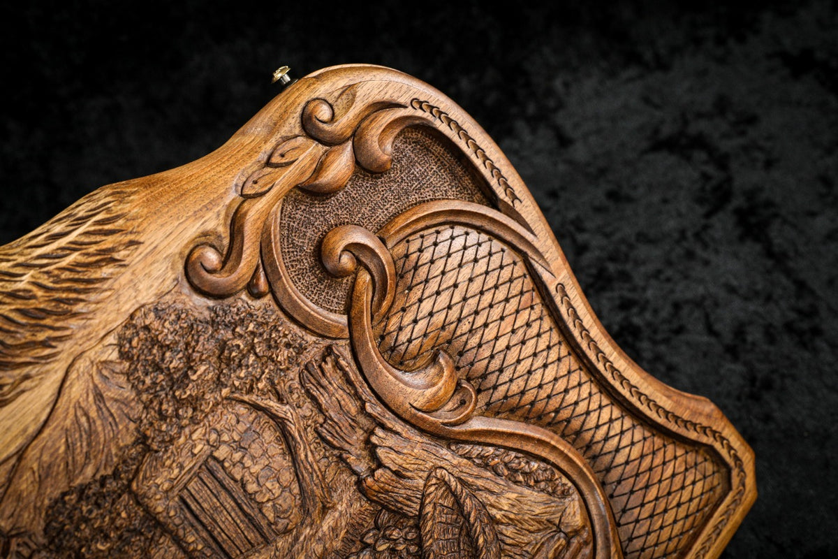 Corner of the lid: rococo scroll, faceted lattice and the carved slope of the Ararat peaks