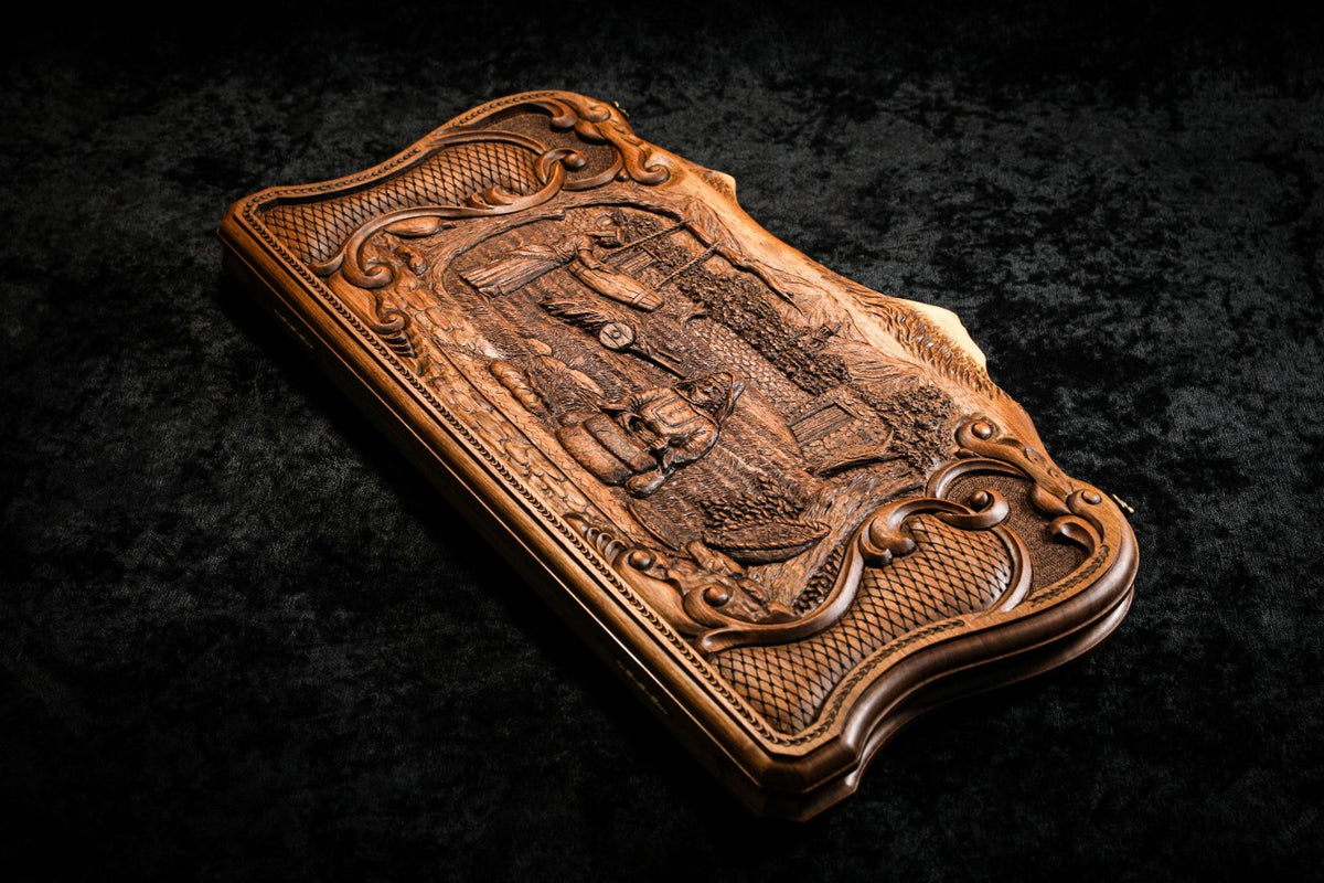 Village backgammon set closed on its back cover, showing the carved basket weave and eternity whirl