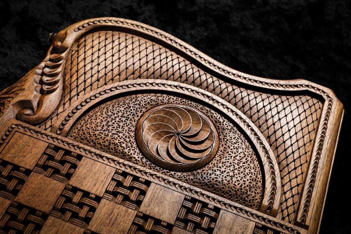 Eternity whirl in deep relief on the back cover beside the basket-weave chequerboard