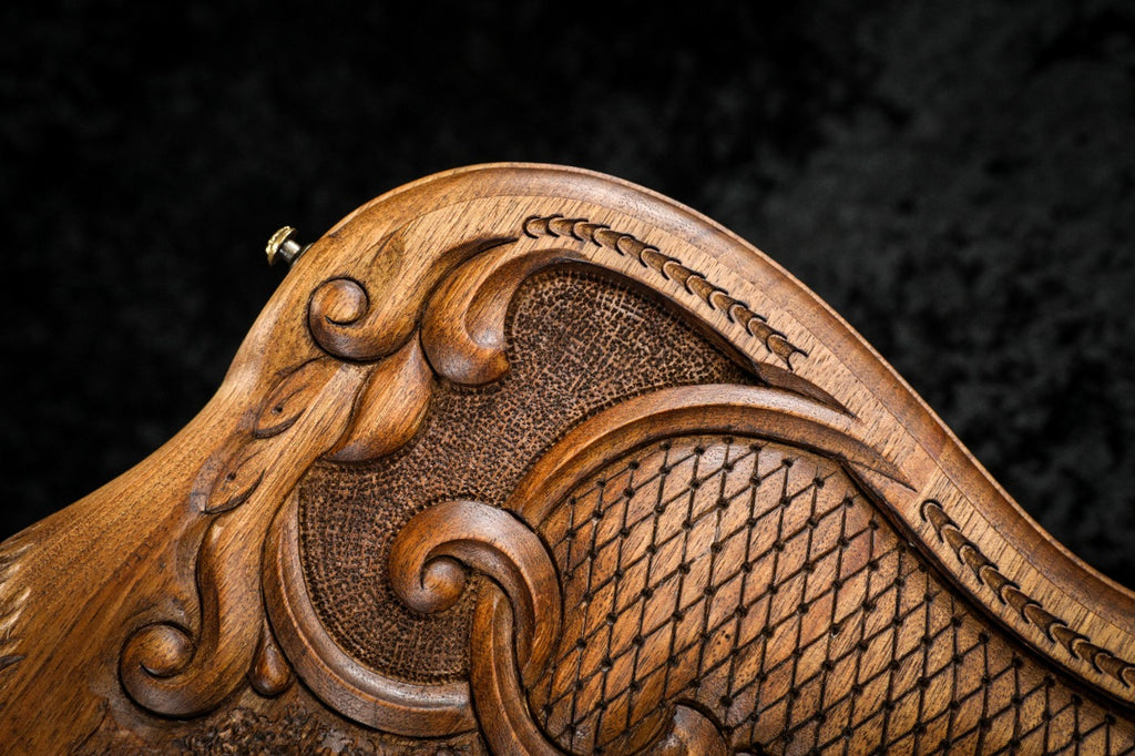 Rococo scroll of the carved frame with the faceted lattice, close-up