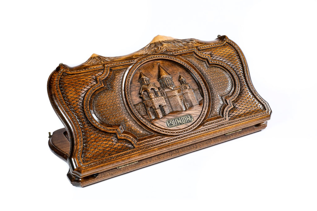 A full view of the closed backgammon board displaying the intricate 3D carving of Etchmiadzin Cathedral within the Ararat silhouette.