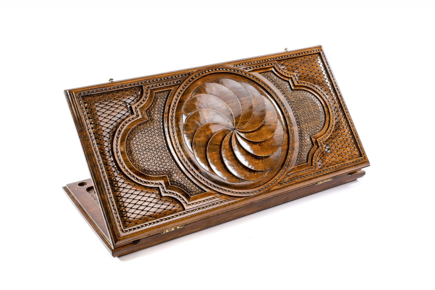 A frontal shot of the closed Eternity classic backgammon board by Hrachya Ohanyan showing the hand-carved Arevakhach symbol.