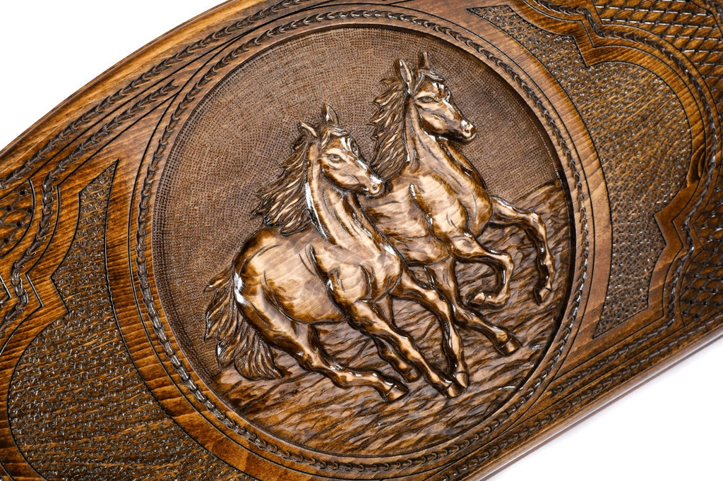 The interior of the open Hrachya Ohanyan horse backgammon set showing the rich wood grain and inlaid pips.