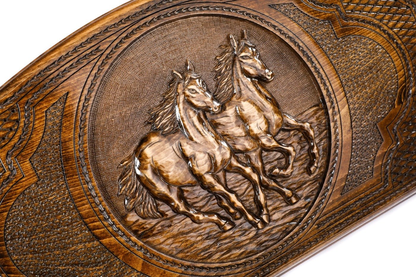 The interior of the open Hrachya Ohanyan horse backgammon set showing the rich wood grain and inlaid pips.