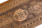 The interior view of the open wooden board highlighting the smooth grain and professional playing pips.