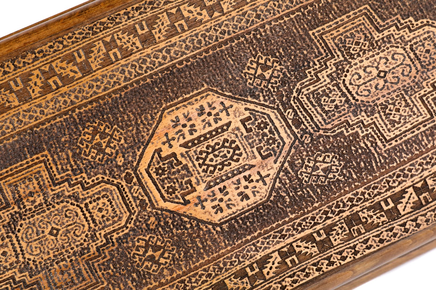 The interior view of the open wooden board highlighting the smooth grain and professional playing pips.