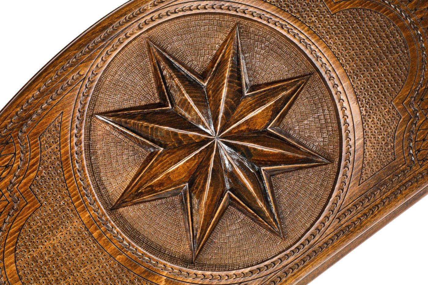 The interior of the open Hrachya Ohanyan Octagram set showing the rich wood grain and the professional-grade playing surface.