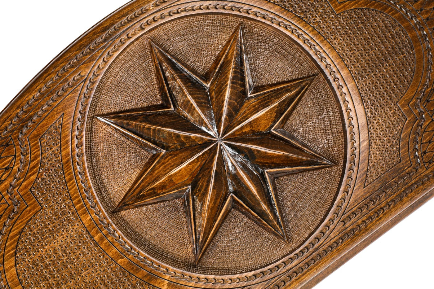 The interior of the open Hrachya Ohanyan Octagram set showing the rich wood grain and the professional-grade playing surface.