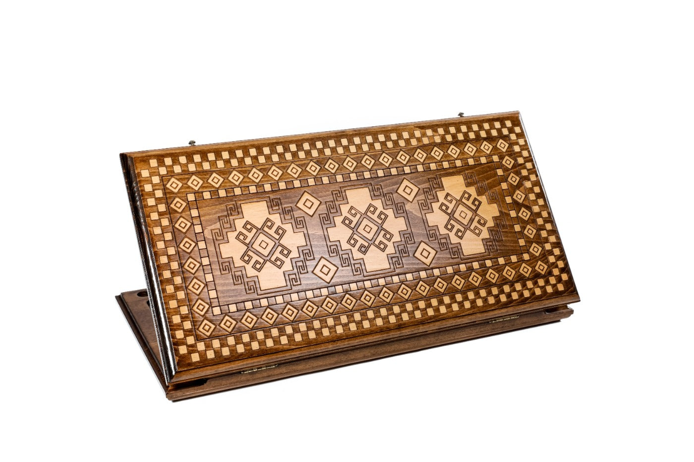 Closed Artsakh Carpet backgammon board with intricate hand-carved textile patterns.