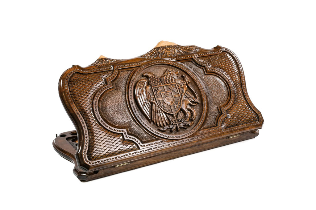 A frontal shot of the closed backgammon board showcasing the Armenian Coat of Arms carved within the copyrighted Mount Ararat outline.