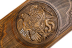 The interior of the open wooden backgammon board highlighting the smooth, polished playing field and pips.