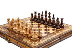 Wooden chess board featuring detailed decorative classic craftsmanship