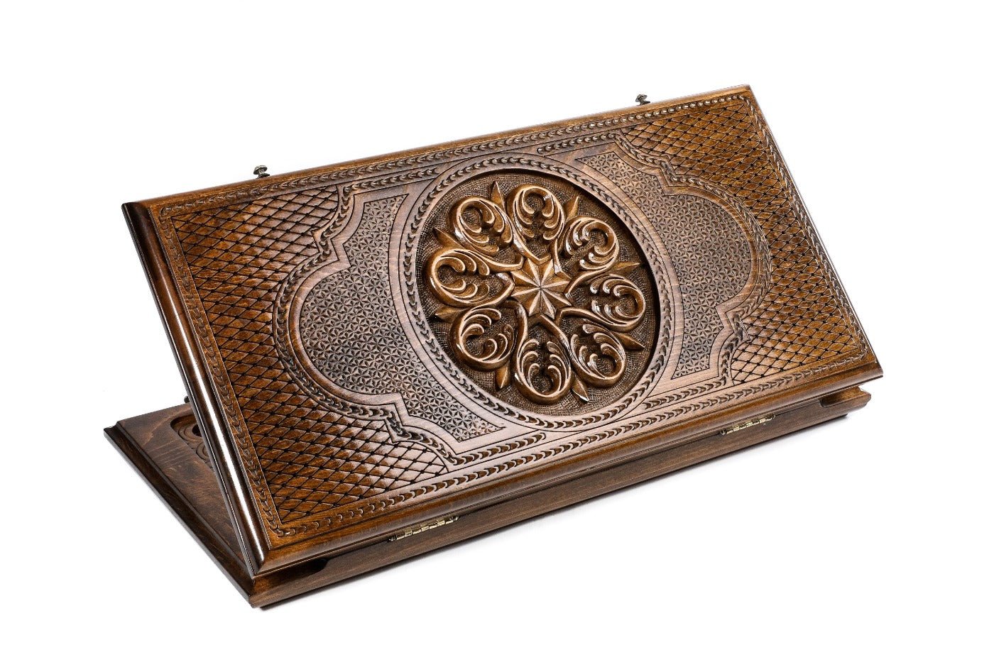 Closed Ornamental backgammon board with intricate hand-carved geometric patterns.