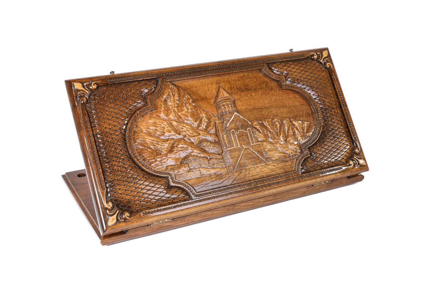 Closed Noravank Monastery backgammon board with detailed architectural wood carving.