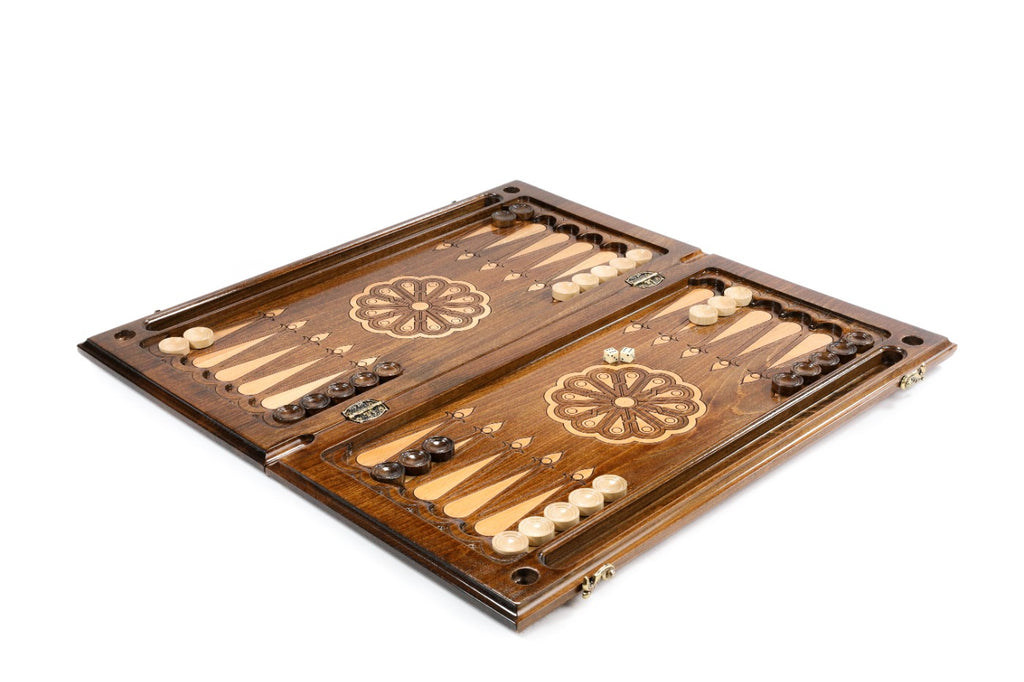 Armenian backgammon set open with light and dark checkers and dice on the 60 cm board, angled view