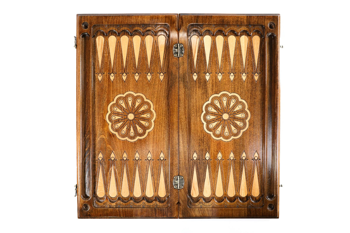 Open Armenian backgammon board 60 cm from above: dark field, pale points, wheel ornament on each half