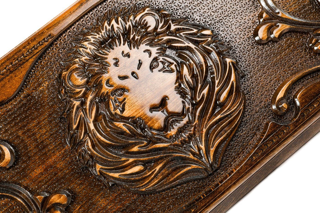 Large wooden backgammon set with carved lion motif detailing