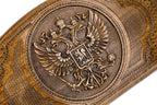 The interior of the open Hrachya Ohanyan Russian heraldry set highlighting the smooth wood grain and professional playing surface.