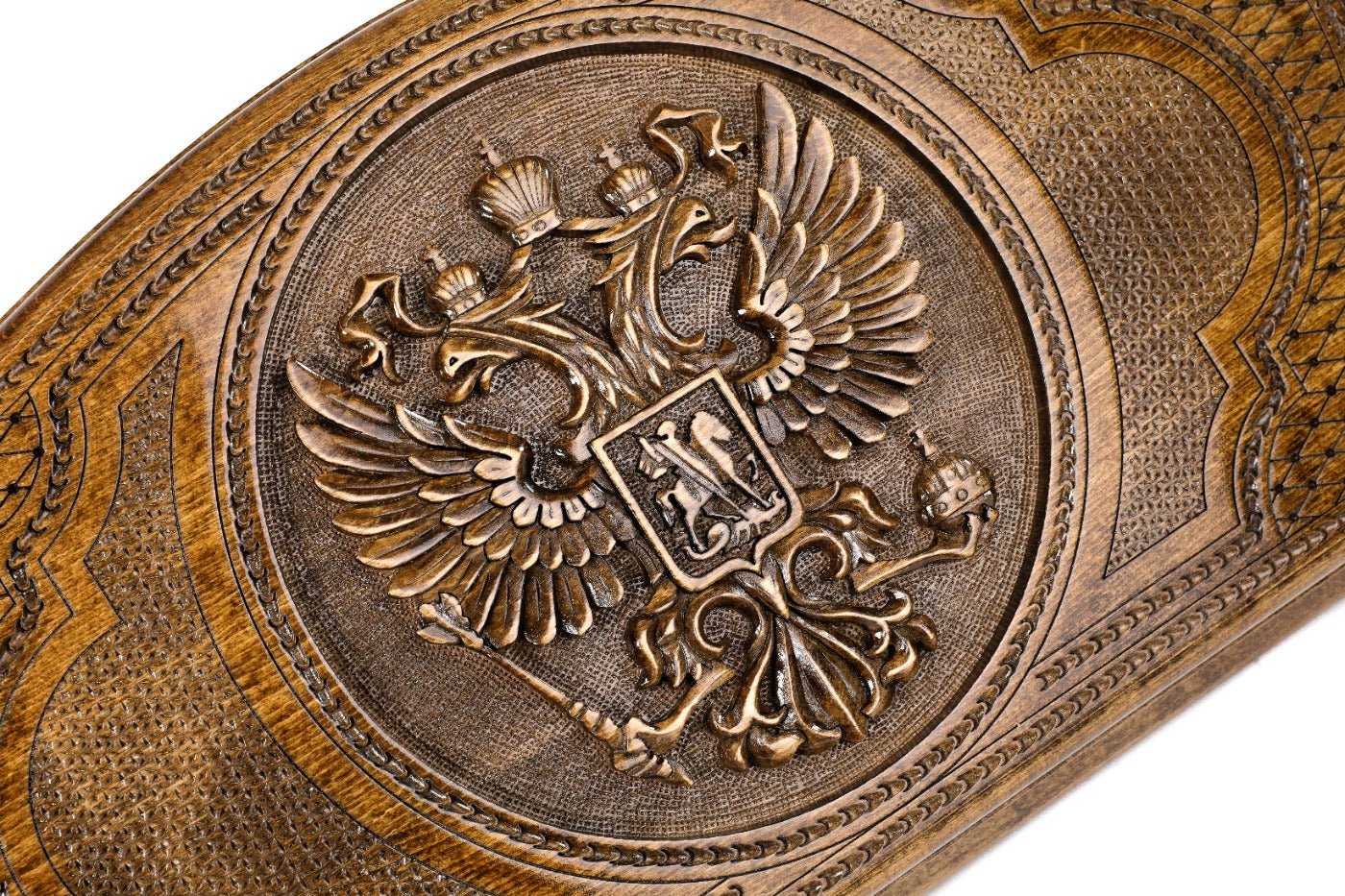 The interior of the open Hrachya Ohanyan Russian heraldry set highlighting the smooth wood grain and professional playing surface.
