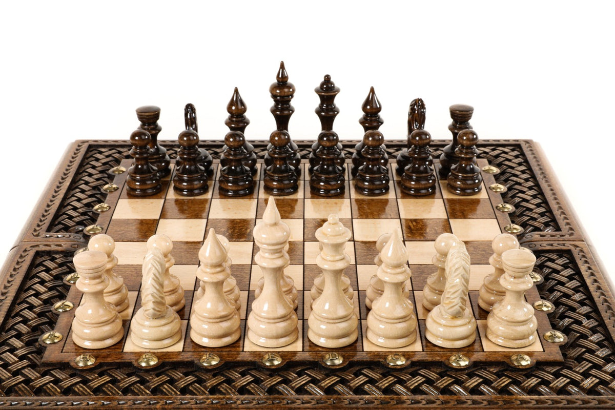Front view of the luxury travel chess set with hand-carved pieces and braid border