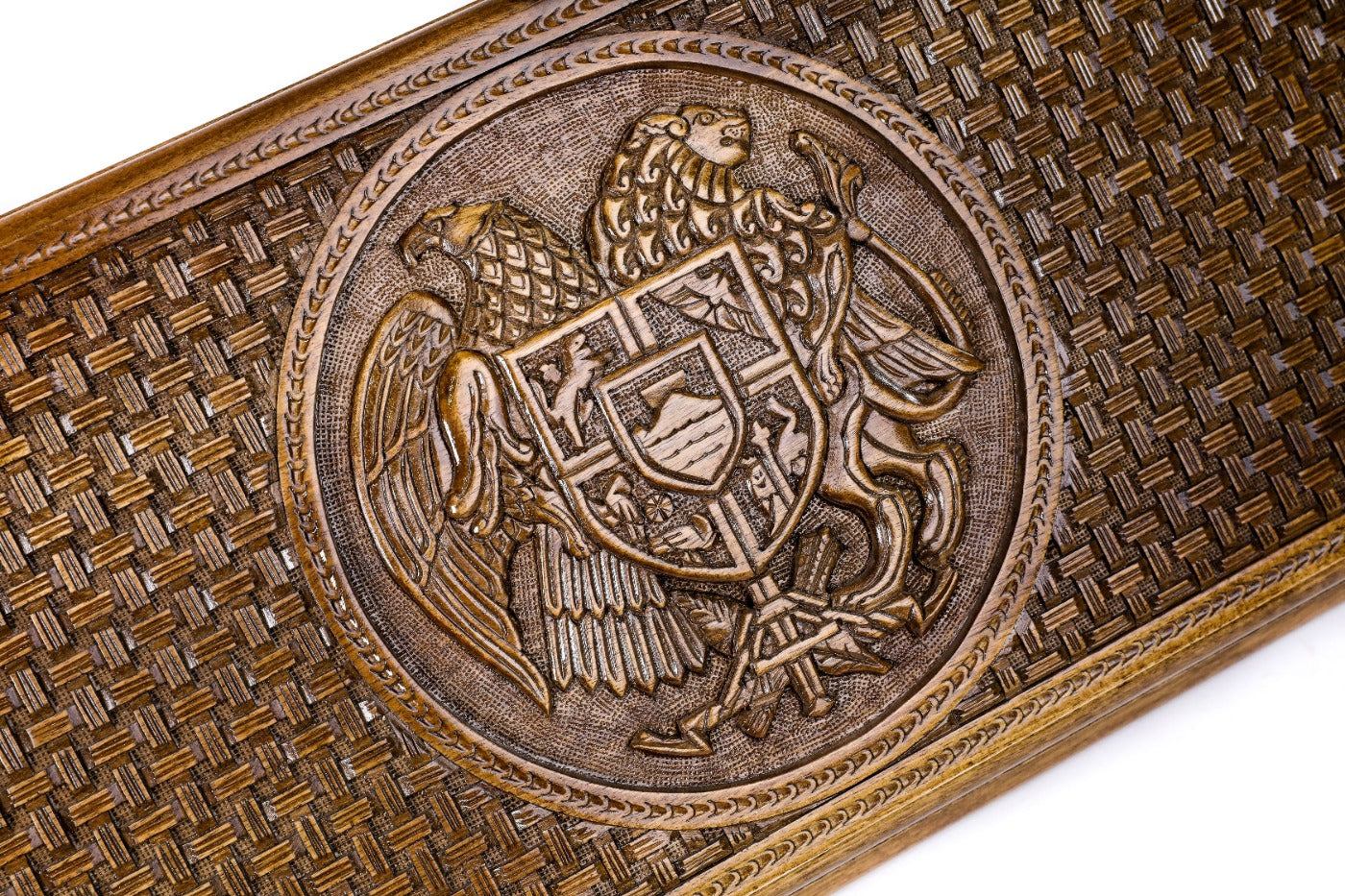 The interior view of the open Hrachya Ohanyan heraldic set highlighting the smooth wood finish and professional-grade pips.