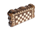 Closed 30 cm chess board standing on edge, scalloped contour outline with scroll ornament frame