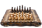 Front view of the travel chess set with all 32 pieces in starting position on the ornamented board
