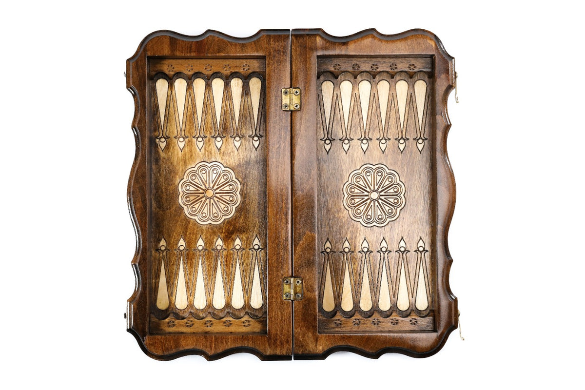 Backgammon field of the travel combo set laid flat, two-tone points and central flower ornaments