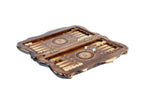 A close-up view focusing on the sharp details of the eagle and lion carvings on the rich, textured surface of the wood.