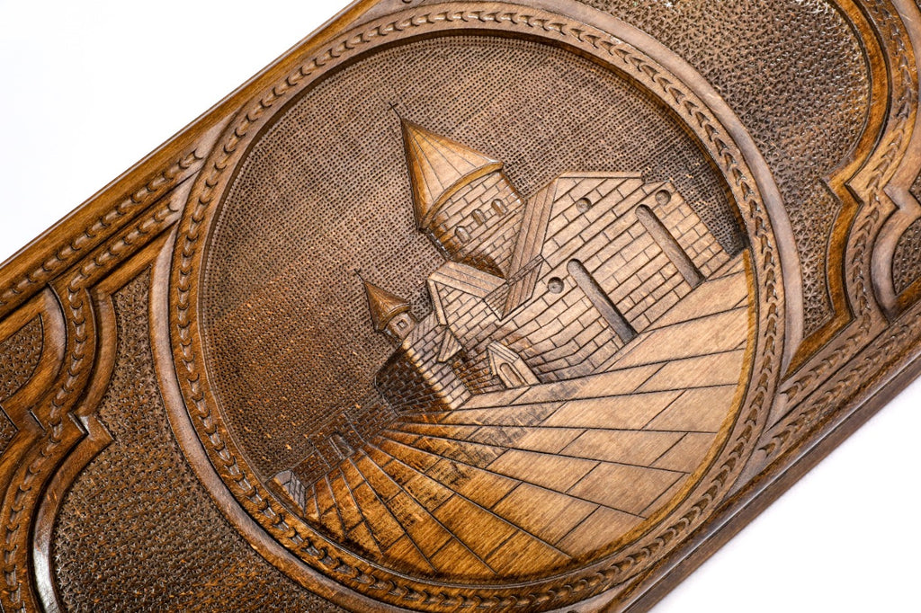 Detail view of the geometric Octagram relief on the solid wood exterior.