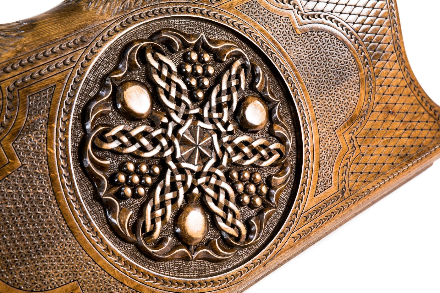 The interior view of the open Hrachya Ohanyan fruit motif board highlighting the smooth wood finish and professional pips.