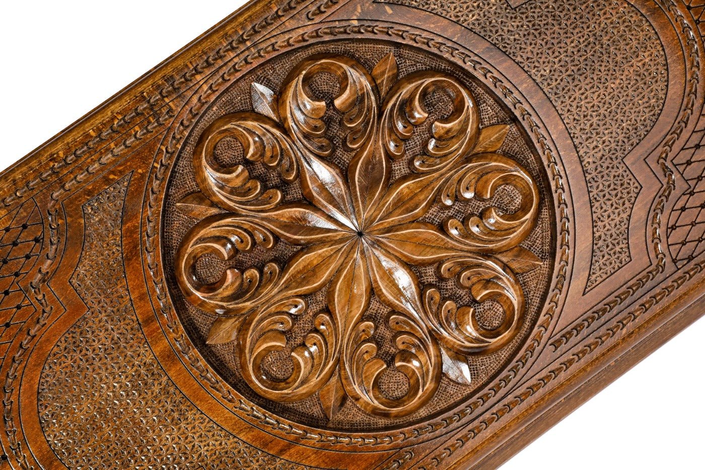 Frontal view of the detailed floral ornamental relief on the solid wood exterior.
