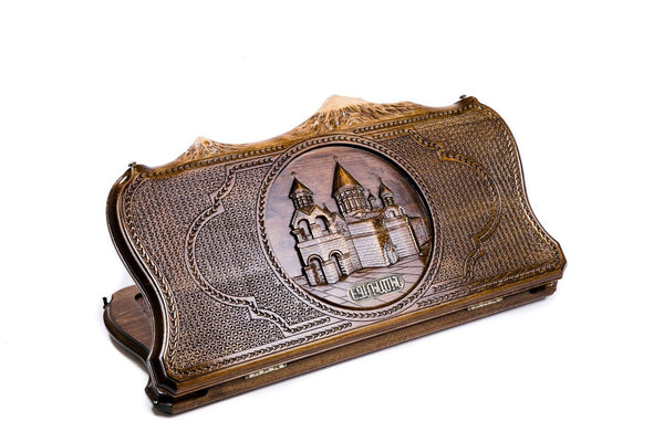 A frontal shot of the closed Etchmiadzin backgammon board featuring the cathedral relief carved inside the copyrighted Mount Ararat outline.