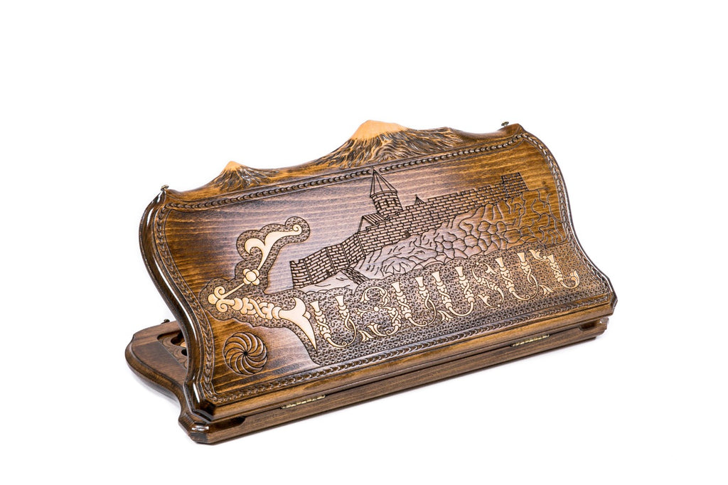 A frontal shot of the closed Hayastan backgammon board featuring Armenian script carved inside the copyrighted Mount Ararat outline.