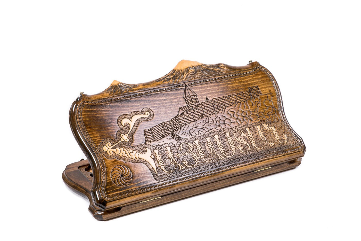 A frontal shot of the closed Hayastan backgammon board featuring Armenian script carved inside the copyrighted Mount Ararat outline.