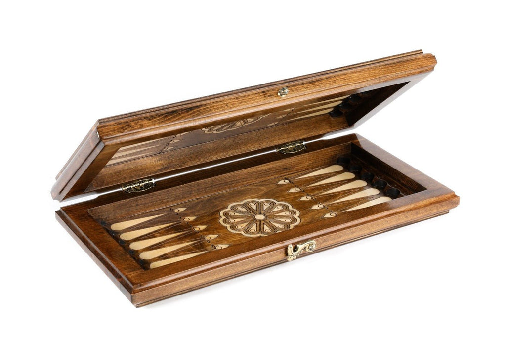 Wooden backgammon set with decorative carved pattern detailing