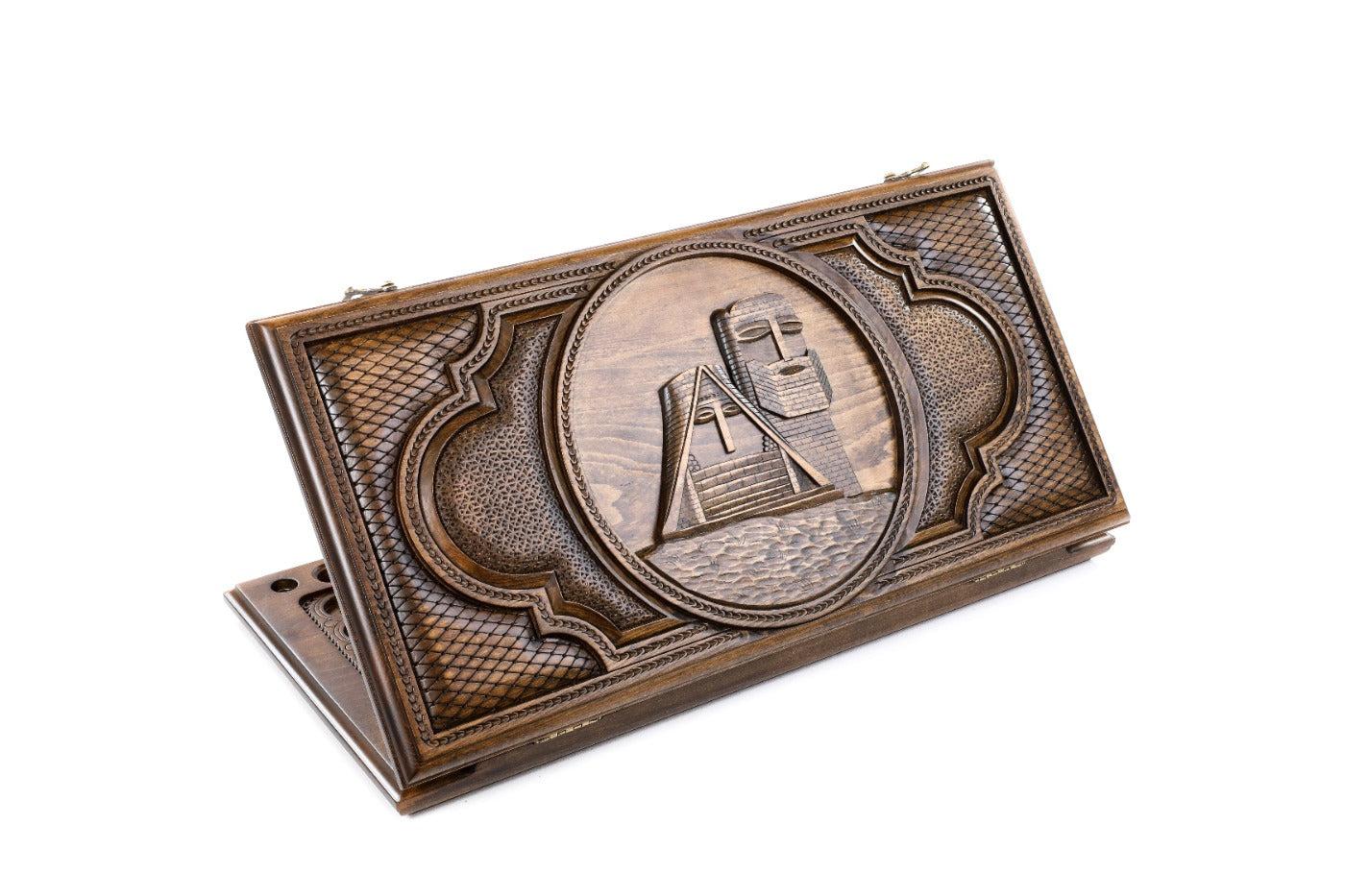 A frontal shot of the closed Gandzasar backgammon board featuring the monastery relief carving in solid wood.