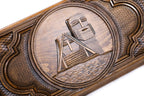 The reverse side of the two-sided Artsakh backgammon board showing the secondary ornamental hand-carvings.