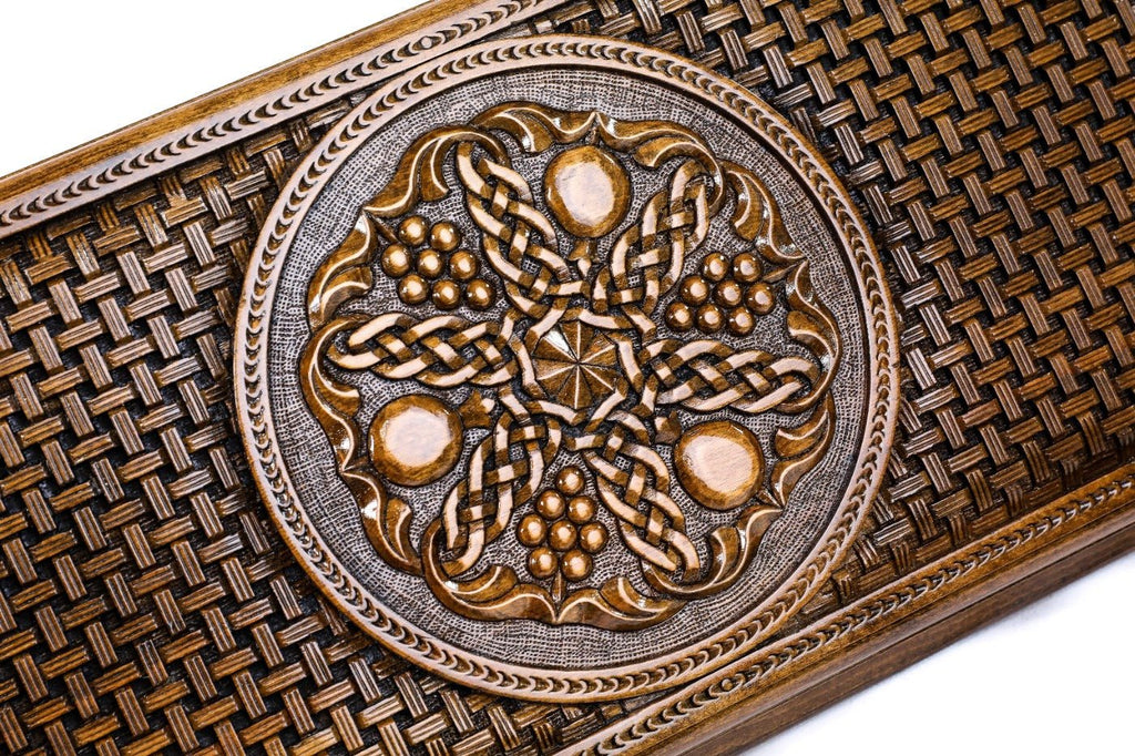 The interior view of the open Hrachya Ohanyan braid motif set highlighting the smooth wood finish and professional playing lanes.